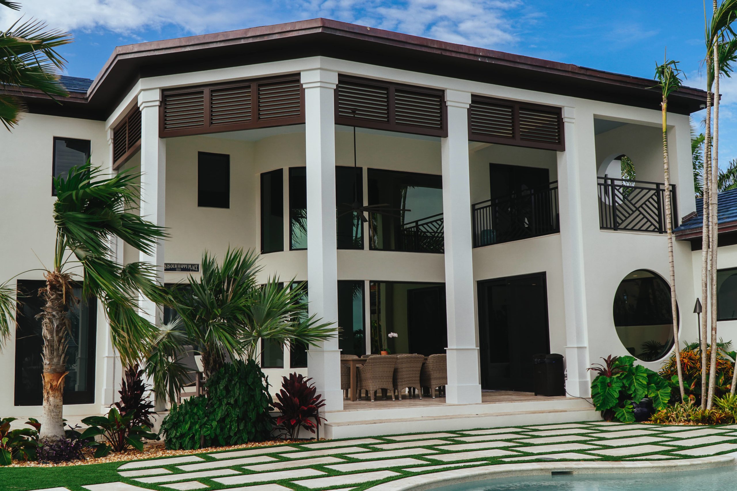 exterior columns and louvers on a coastal home